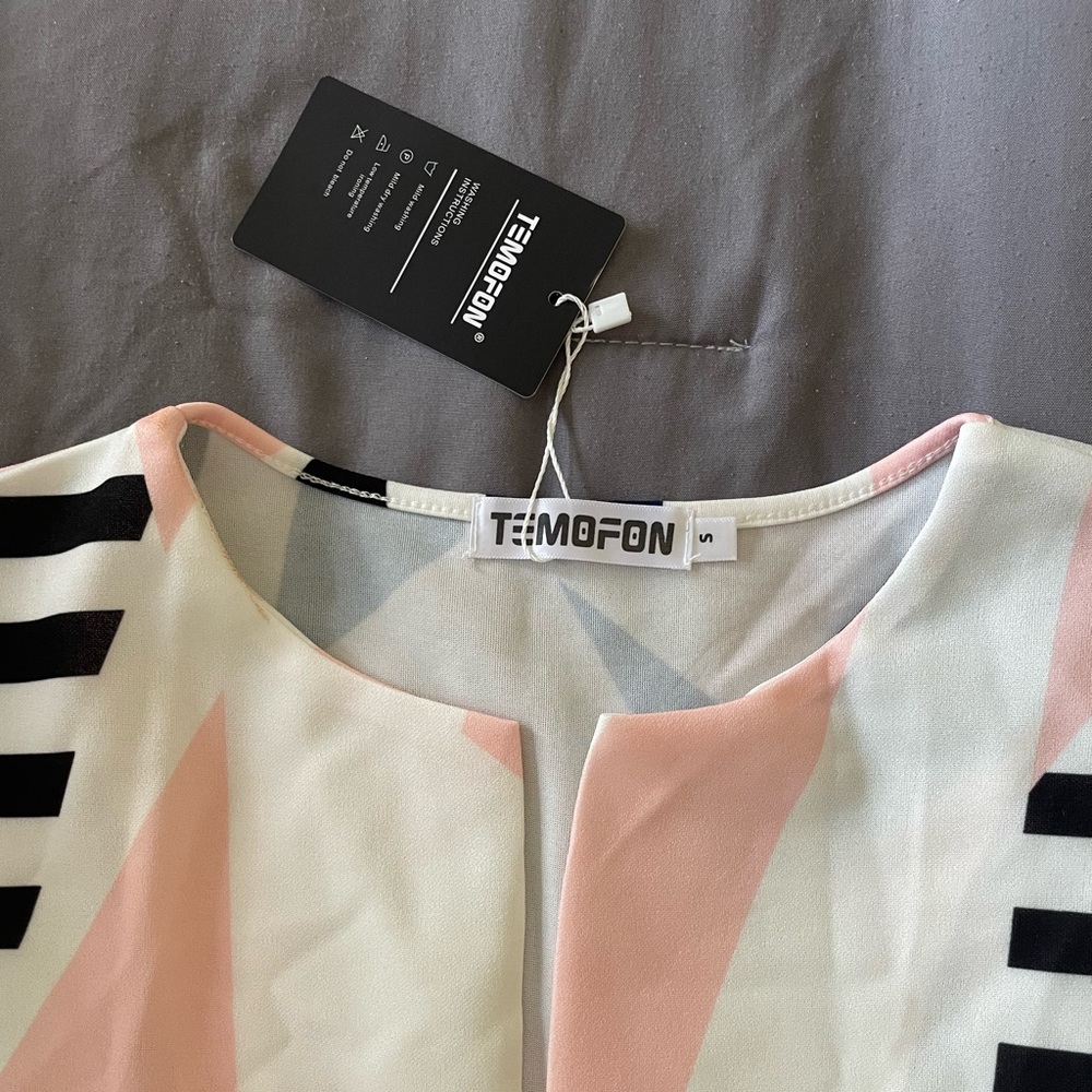 Knee length dress, Size Small. Never worn with tags still on